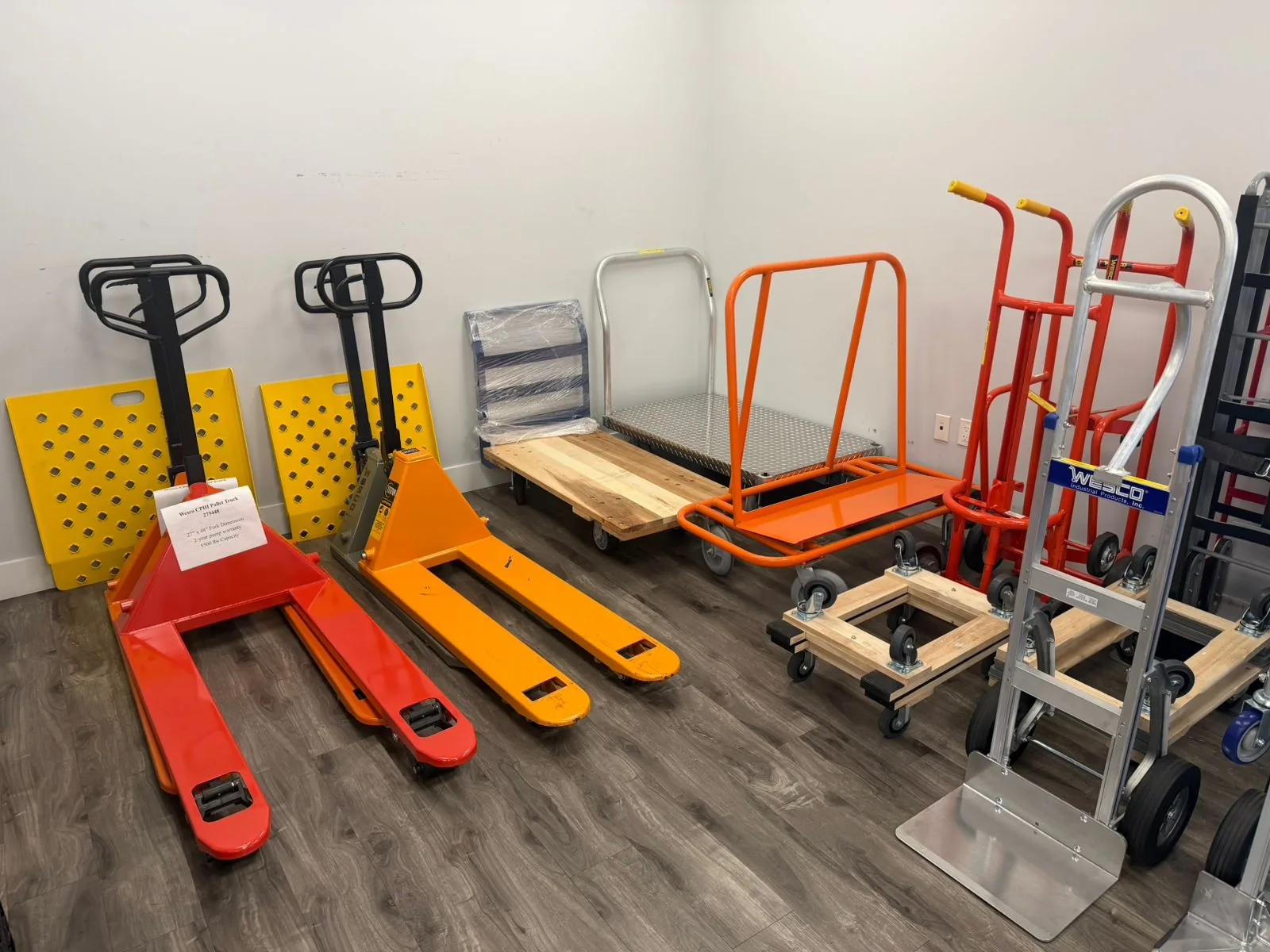 Pallet jacks and platform trucks in stock at the Douglas Equipment Miami warehouse — same-day pickup available